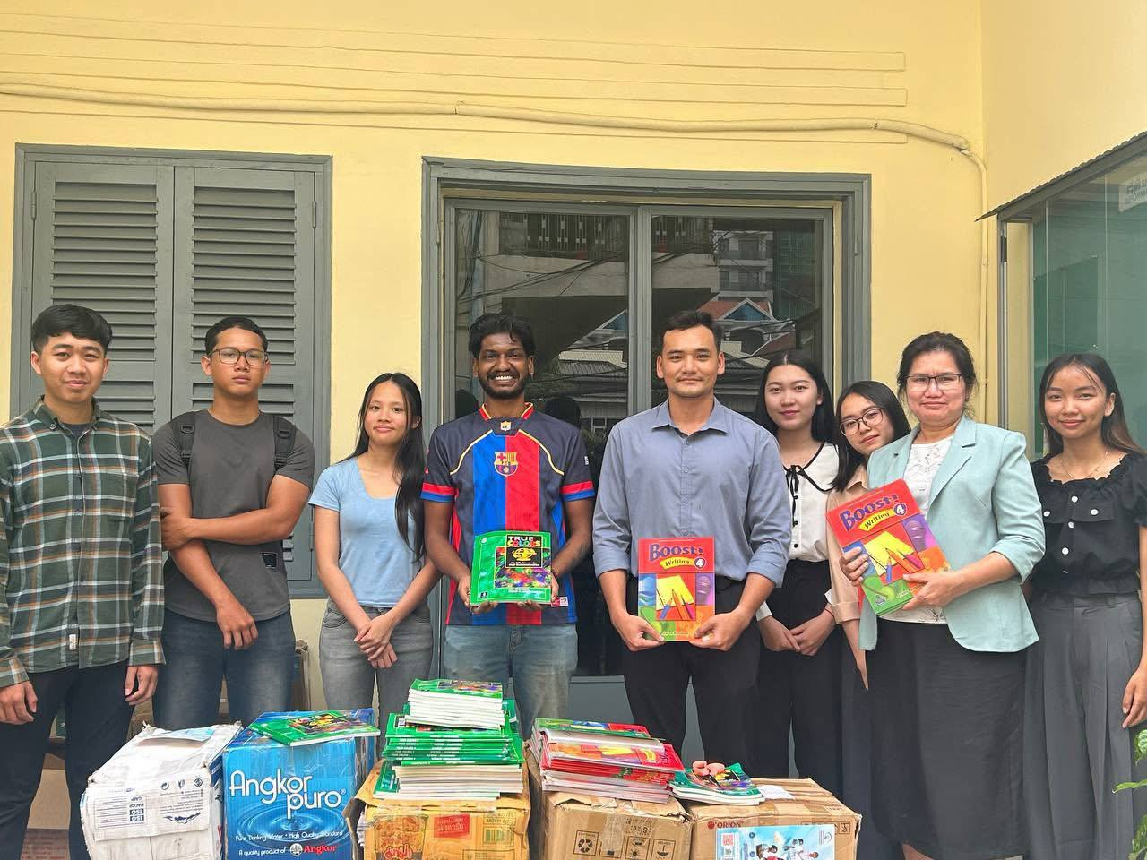 Book donation group photo